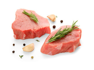Fresh raw steaks with rosemary, garlic and peppercorns on white background