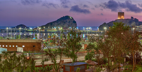 View of the Black Sea, Pier, Marina and Fortress at night and before dawn in Sile, Turkey. Seascape
