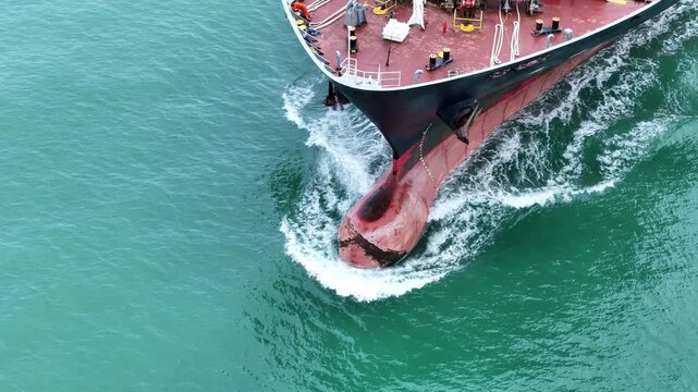 Nose Cargo container Ship, cargo vessel ship carrying container and running for import export concept technology freight shipping sea freight by Express Ship. front view
