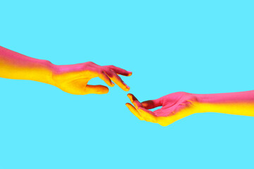 Obraz premium Toned female hands on blue background