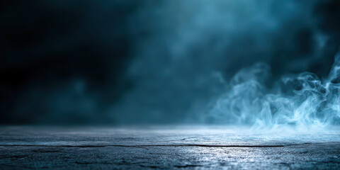 Misty blue smoke swirling over dark textured floor creating dramatic foggy atmosphere