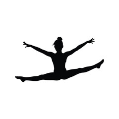 Silhouette of a gymnast performing the splits with her arms outstretched
