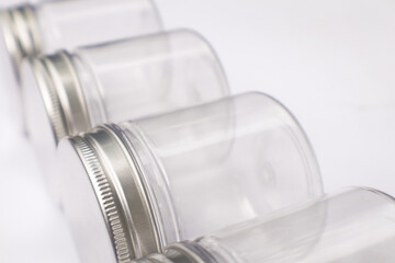 A Group of Bottles or Jars Packaging Mockup on an Isolated White Background