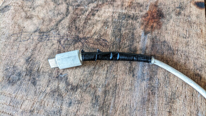 Close up view USB charging cable. Selective focus