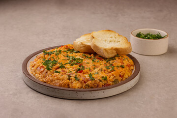 Menemen is Turkish Breakfast, Eggs With Peppers And Tomatoes Or Turkish Egg Scramble. 
