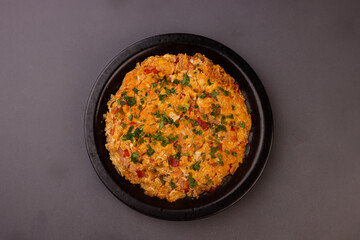 Menemen is Turkish Breakfast, Eggs With Peppers And Tomatoes Or Turkish Egg Scramble. 