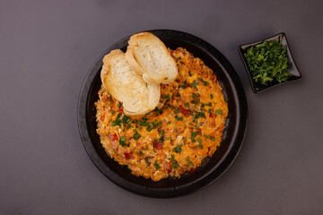 Menemen is Turkish Breakfast, Eggs With Peppers And Tomatoes Or Turkish Egg Scramble. 