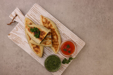Zhingyalov Hats or Jingalov Hats is Armenian Herb Stuffed Flatbread From The Republic Of Artsakh.
