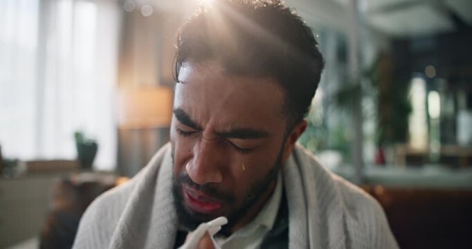 Sick man, flu and blowing nose with tissue for sneeze, sinus or virus symptoms in home. Male person, viral infection or allergy with toilet paper or blanket for fever, mucus or influenza in house