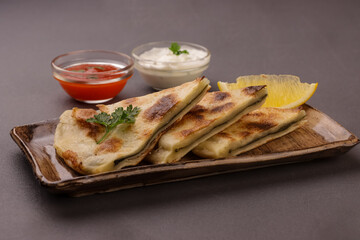 Gozleme is a Classic Turkish Flatbread, Stuffed With Spinach and Feta Cheese. 