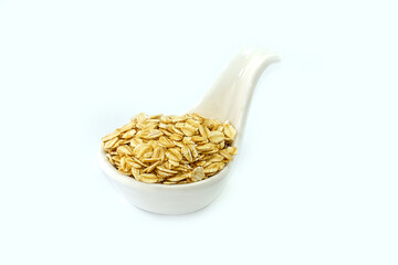 Oatmeal in a bowl on a white background. Oatmeal in a cup. Contains antioxidants, which can help...