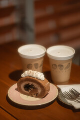 Delicious cake and a warm cup of coffee