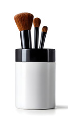 Makeup brushes stored in a white holder with black rim