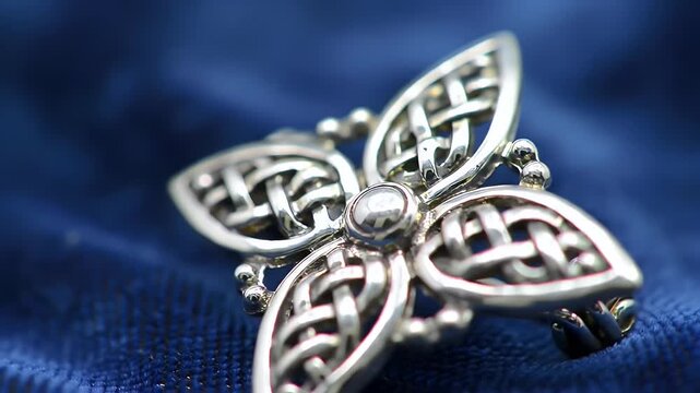 Silver Celtic Knot Cross on Blue Velvet Intricate Religious Symbol