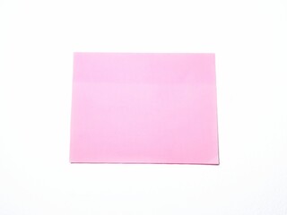 Blank pink sticky note isolated on white background with clipping path. Sticky note paper with shadow. Pink note paper looks vintage with wavy edge texture.