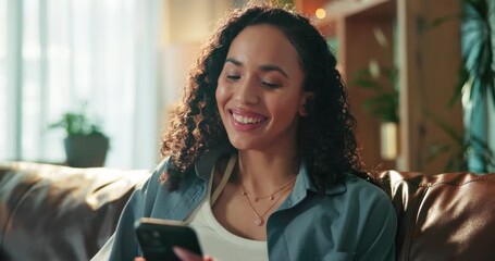 Woman, phone and smile with texting on sofa, contact and web chat for online dating in lounge at home. Person, smartphone and check notification with mobile app, scroll and social network at house - Powered by Adobe