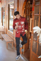 A man dressed in Chinese New Year clothing