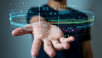 Businessman holding futuristic hologram showing financial data and statistics