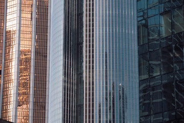 Fototapeta premium walls and empty windows of a modern building on a big city street without people