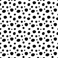 Abstract black polka dot pattern on a light background. Minimalist and versatile design.