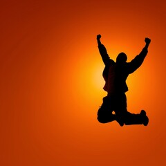 Skyward Triumph: A silhouette captures a moment of exhilaration as a person soars against a vibrant orange backdrop, symbolizing triumph and achieving personal goals.
