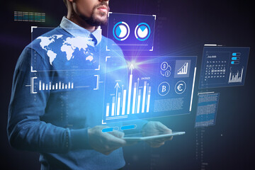 Professional analyzing data on a digital tablet with futuristic interface elements and global information