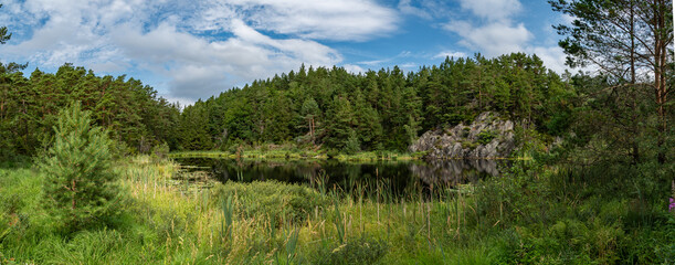 Panorama view of lake in Kristiansand Dyrepark in southern Norway
