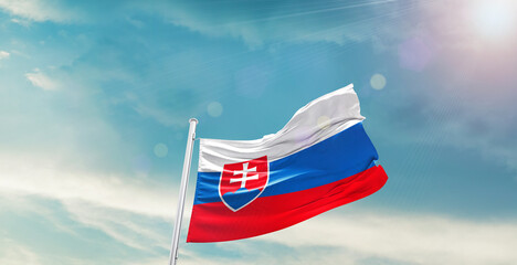Slovakia national flag waving with beautiful sky.