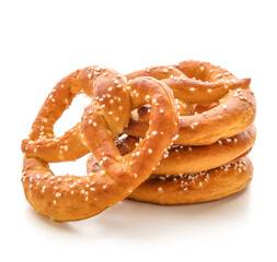 Many tasty salted pretzels on white background