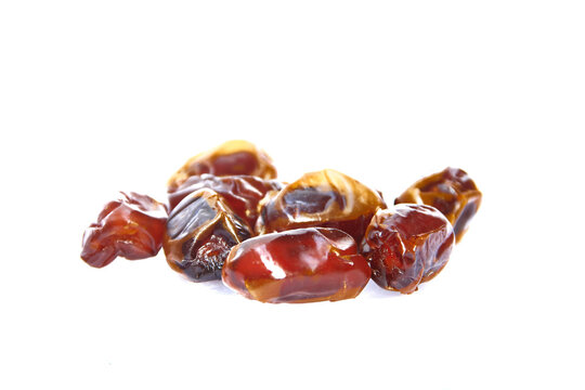 Ripe tamarind or Tamarindus indica fruit on white background