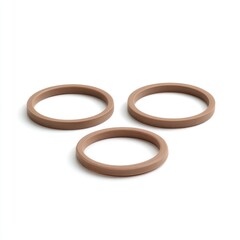Three light brown rubber rings