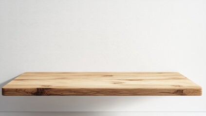 A light beige wooden shelf against a white wall