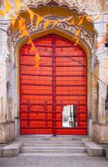 Vibrant Red Temple Gate in Pushkar, Rajasthan, India