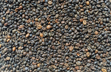 Green coffee beans background. Alternative drink concept. Selective focus. Horizontal orientation. Top view