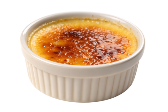Crème brûlée dessert in white ceramic dish with golden caramelized sugar crust, rich custard beneath surface, isolated on a transparent background