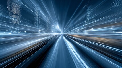 Fast-moving light trails on city transportation tracks at night