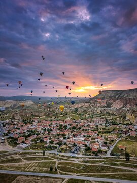 Drone aerial view of hot air balloons flying over Cappadocia in Turkey