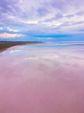 Drone capturing aerial view of pink Tuz Lake in Turkey