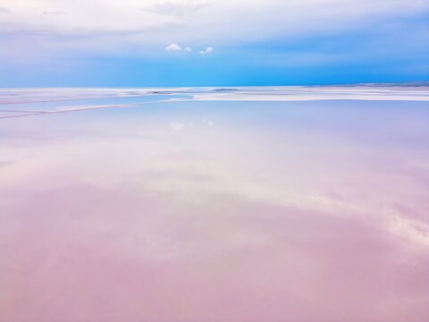 Drone capturing aerial view of pink Tuz Lake in Turkey