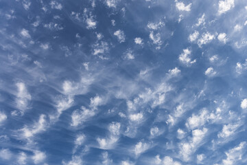 abstract background with blue sky and white clouds pattern. minimalist design with abstract nature...