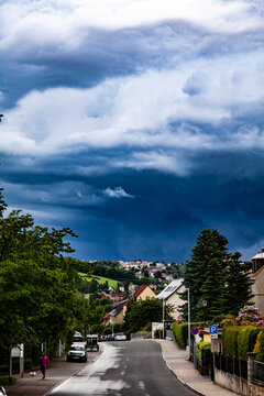 big storm clodus over a rural town