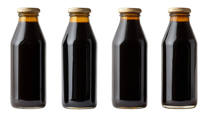 Four Glass Bottles of Soy Sauce Isolated on White.
