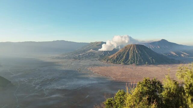 Aerial view of Amazing Mount Bromo volcano during sunrise sky,Beautiful Mountains Penanjakan in Bromo Tengger Semeru National Park,East Java,Indonesia.Nature landscape background,High quality video
