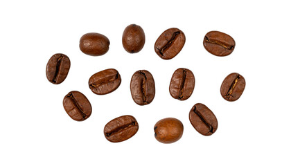 Scattered and separated roasted coffee beans on a white background
