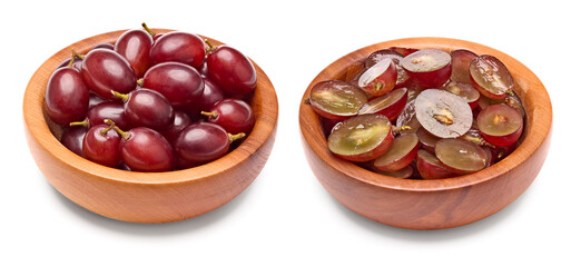 red grapes berries in wooden bowl isolated on white background. clipping path
