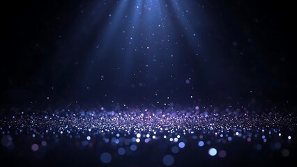 Photo of blue glitter particles and light rays background