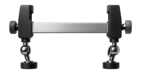 PCB holder with adjustable clamps for stable positioning during soldering in a workshop.