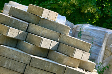 Stacked paving slabs ready to be laid on the road