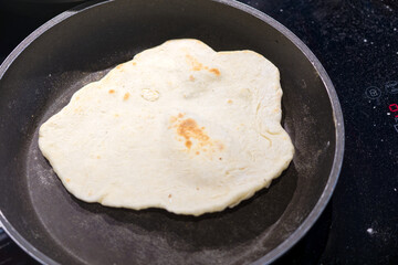 High angle view of naan in pan. Photo taken June 1st, 2025, Zurich, Switzerland.