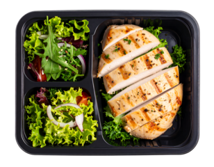 A pre-packaged meal featuring grilled chicken breast and fresh salads isolated on transparent background.